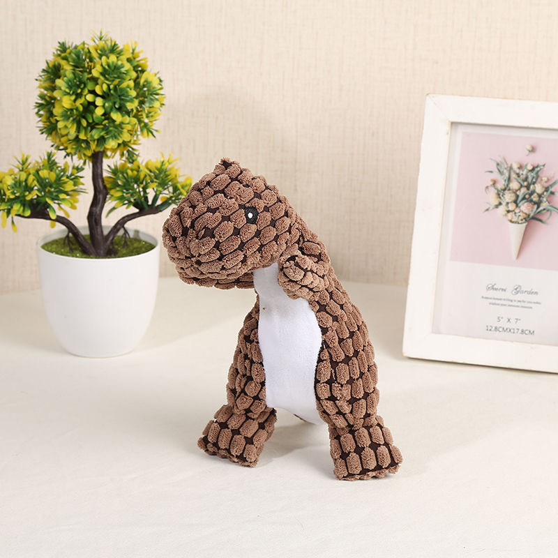 Hundleksak dinosaurie med pip i majsfiber – brun