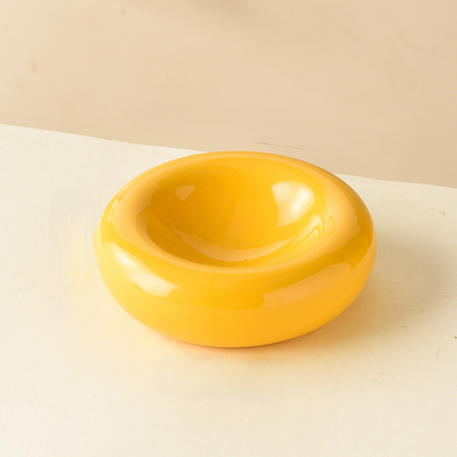 Donutformad kattskål i keramik, gul